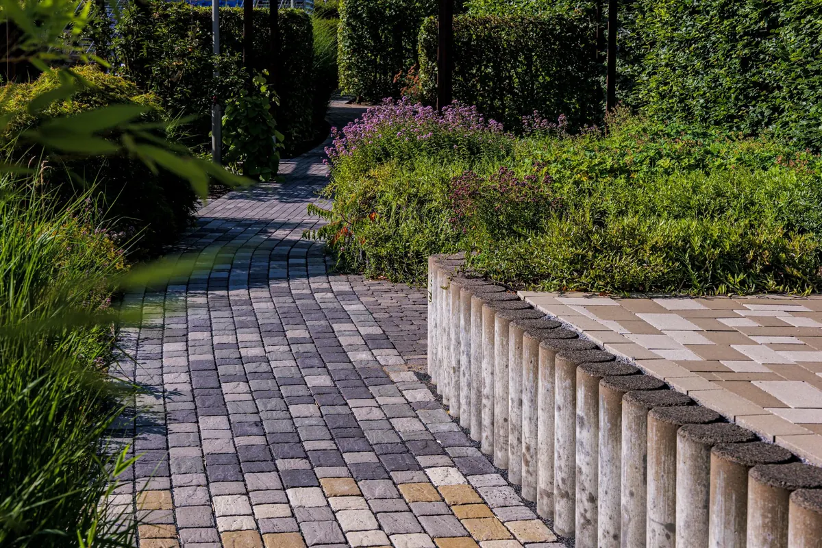 How to Build a Curved Pebble Path with Flexible Edging